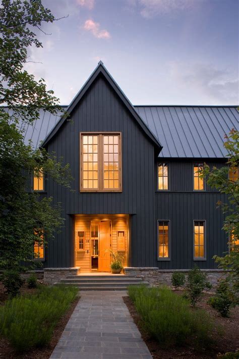 grey house black metal roof|gray exterior with black trim.